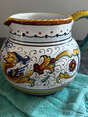 Hand-Painted White Ceramic Pitcher with Yellow, Blue and Green Motif